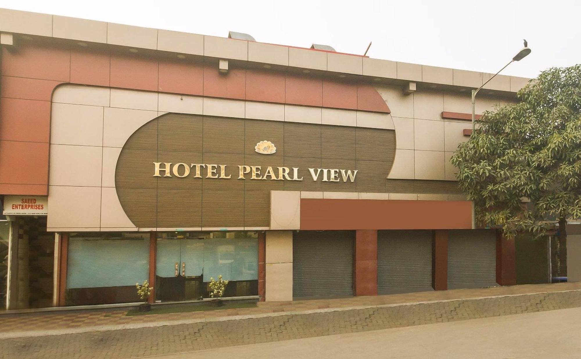 Capital O Pearl Near Us Embassy Hotel