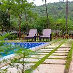 Grey Mosaics By Stayvista - Mountain-View Villa In Vasai With Pool, Spacious Lawn & Terrace