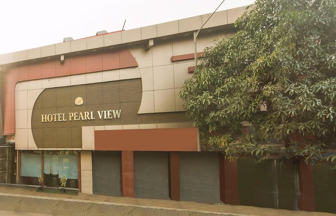 Hotel Capital O Pearl Near Us Embassy Mumbai
