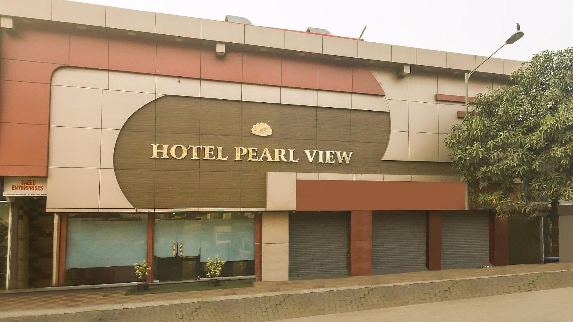 Capital O Pearl Near Us Embassy Hotel