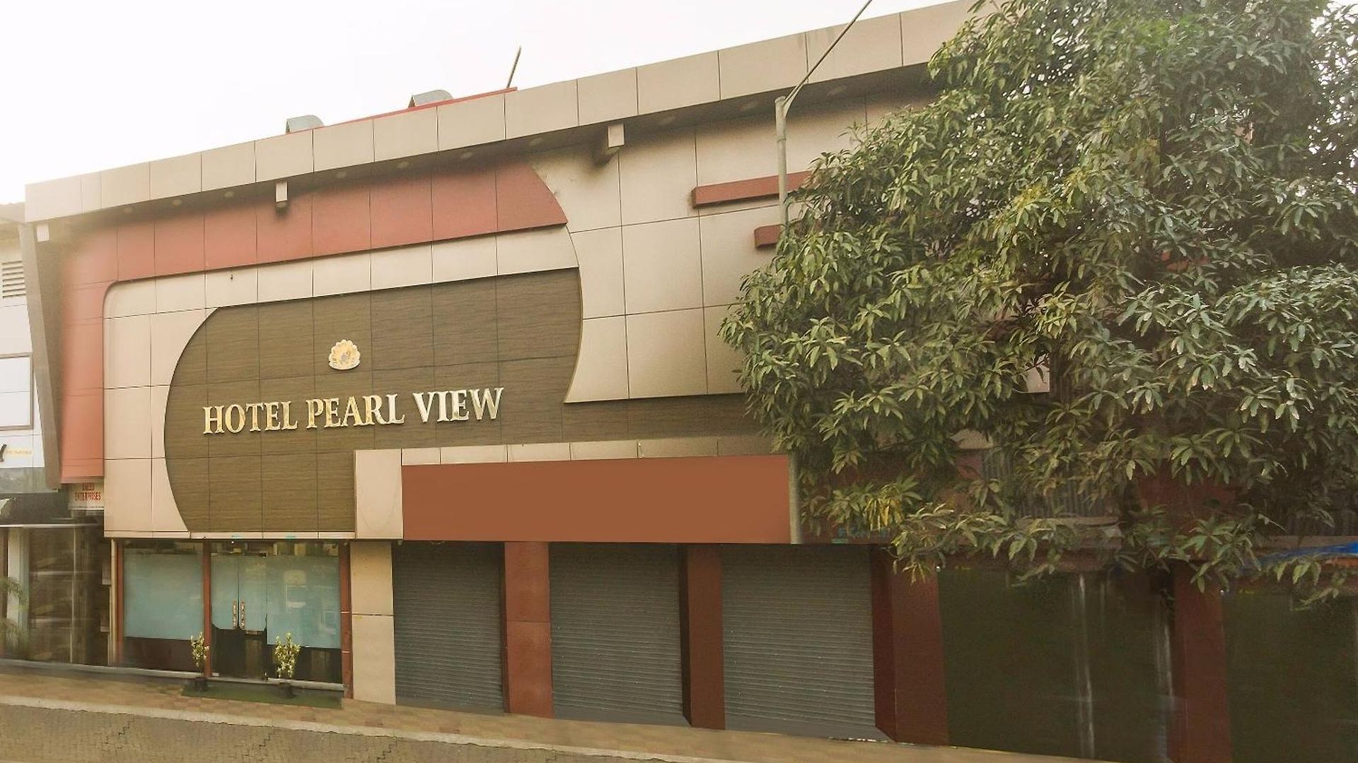 Hotel Capital O Pearl Near Us Embassy Mumbai