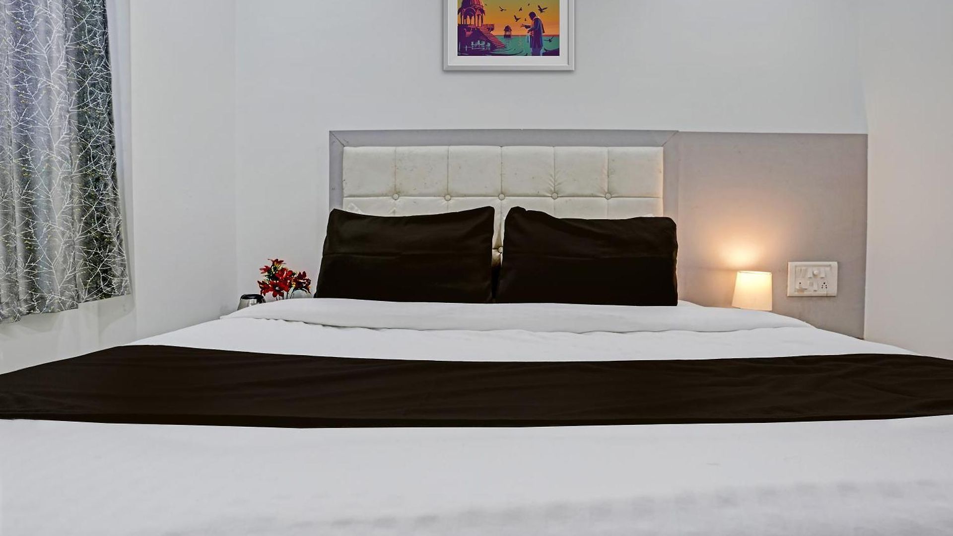 Capital O Park Residency Hotel