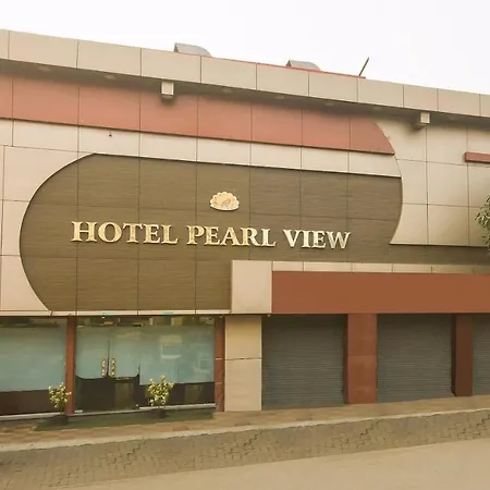 Hotel Capital O Pearl Near Us Embassy