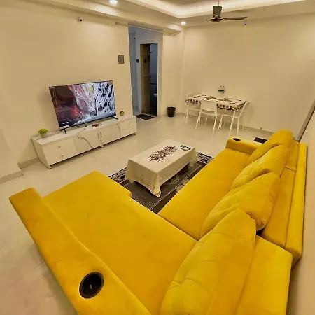 Chic 2 Bhk With Balcony & Bold Yellow Lounge Powai Apartment Mumbai