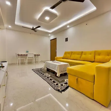 Chic 2 Bhk With Balcony & Bold Yellow Lounge Powai Apartment
