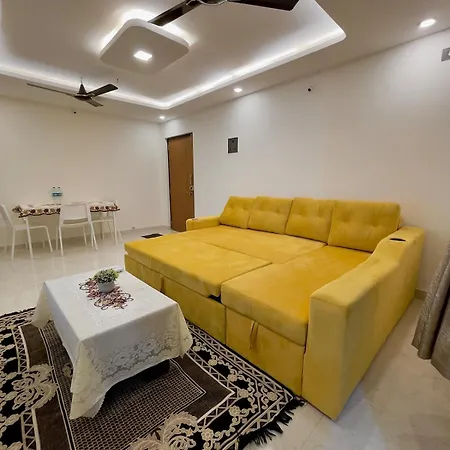 Chic 2 Bhk With Balcony & Bold Yellow Lounge Powai Apartment