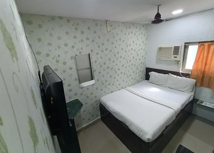 Hotel Ovo Residency Near Masjid Bunder Railway Station
