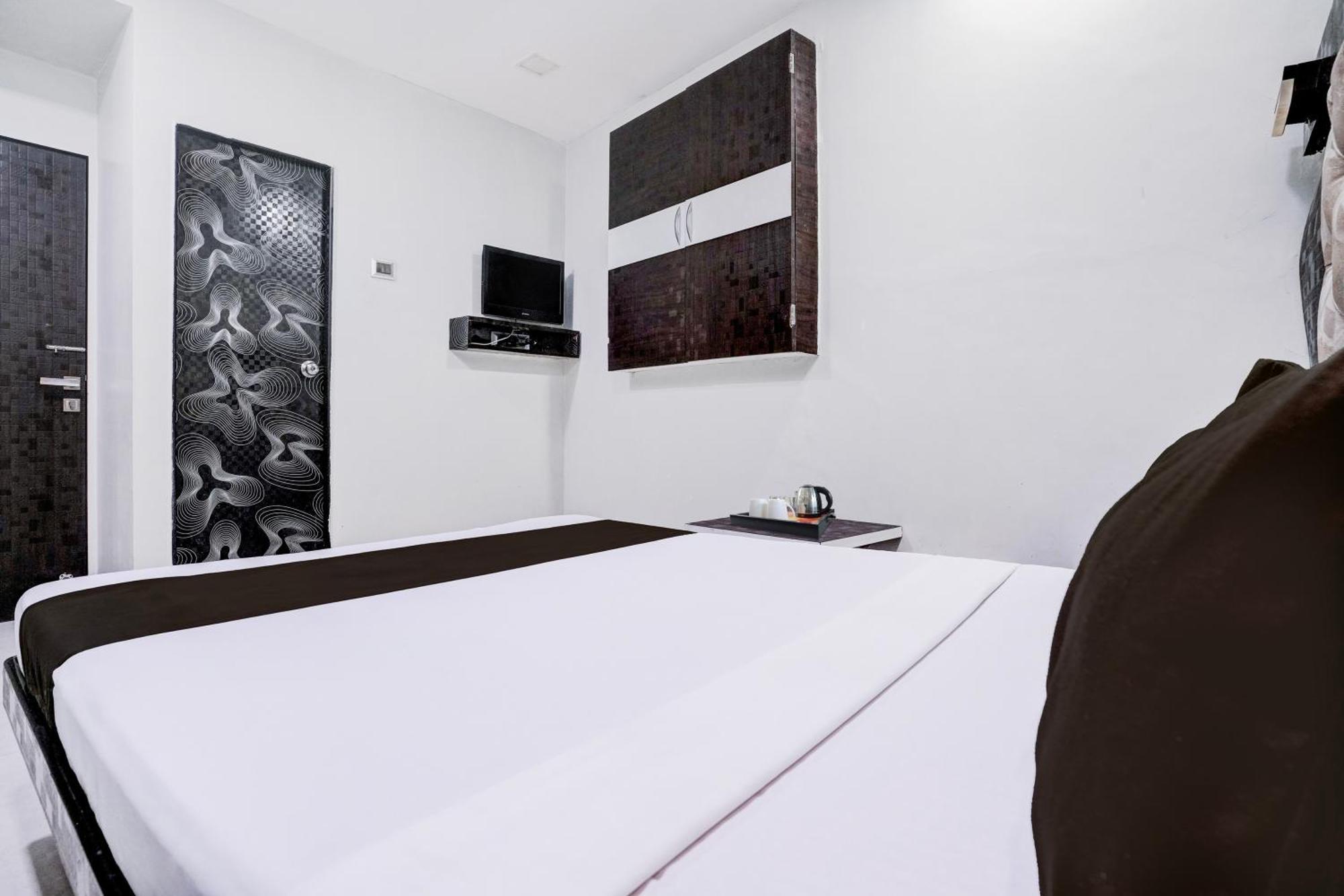 Hotel Super Collection O Asalpha Near International Airport