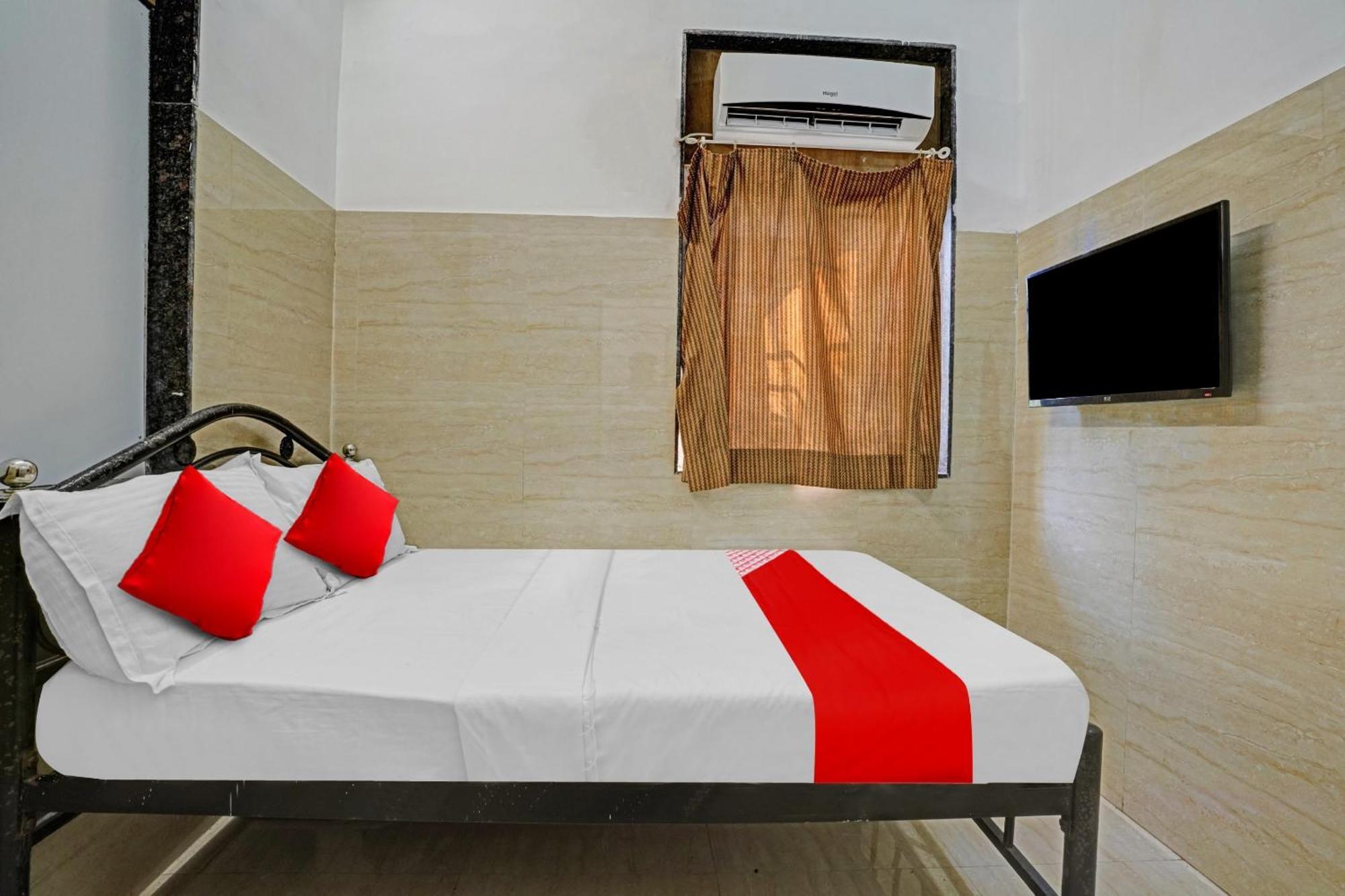 Oyo Flagship Raj Near Juhu Mumbai